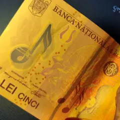 Rumuńska waluta to lej. Na banknocie 5 lei widnieje portret kompozytora George Enescu i nuty.