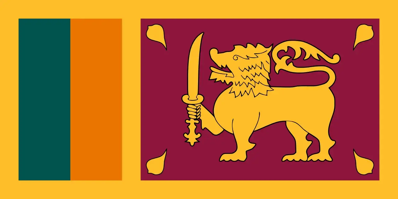 Flaga Sri Lanki z lwem i mieczem, symbol wolności i niezależności. Planujesz podróż? Sprawdź, czy potrzebna jest wiza Sri Lanka.